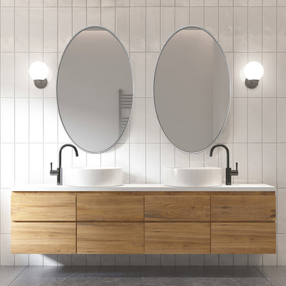 DECOTU Silver Iron Frame Oval Wall Mirror, Wall-Mounted Setup in Bathroom Space