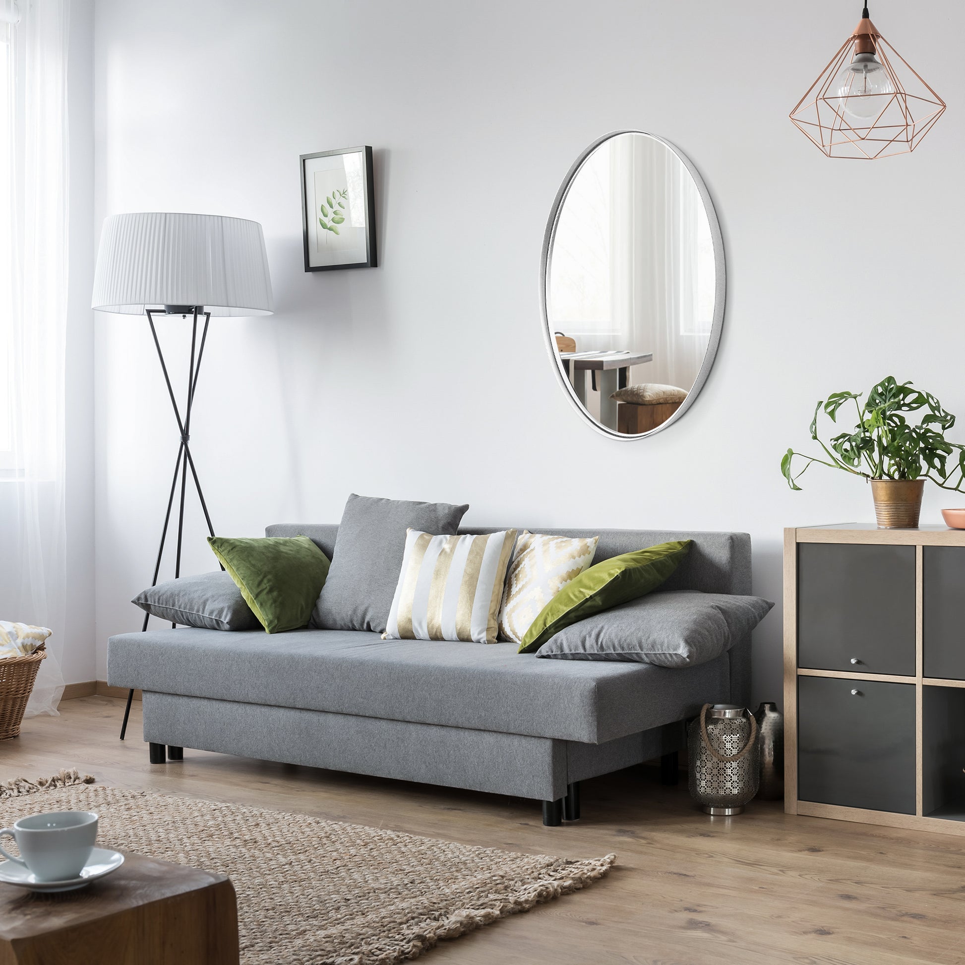 DECOTU Silver Iron Frame Oval Wall Mirror, Wall-Mounted Setup in Living Room Space